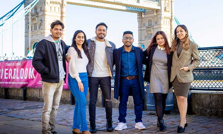 Group of students standing in front of Tower London