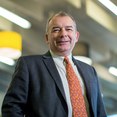 Professor John Latham CBE on campus