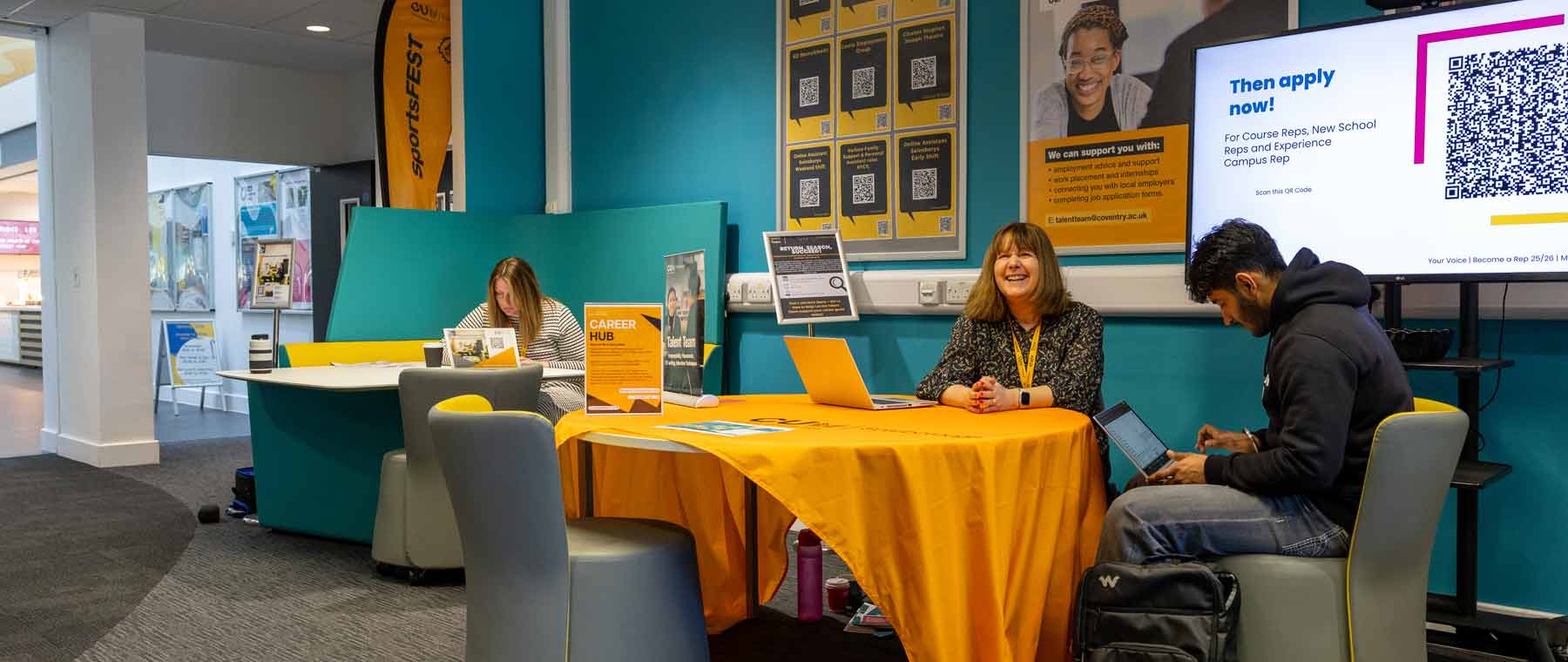 event people sat at a desk