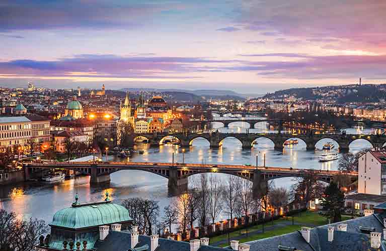 Sunsetting over city with bridges