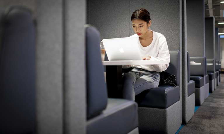 Student working on her laptop