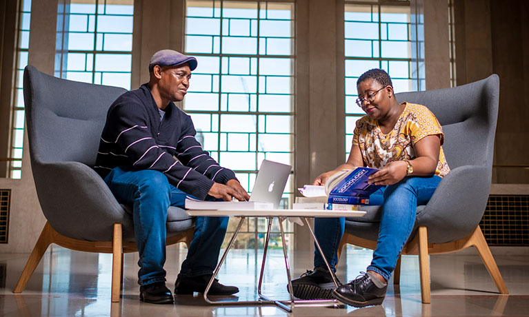 Two students sat down talking