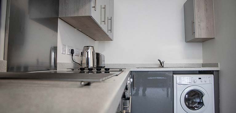 Kitchen worktops and washing machine in Islands house