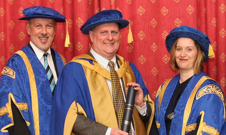 Jim Dillon receiving his Honorary Doctorate