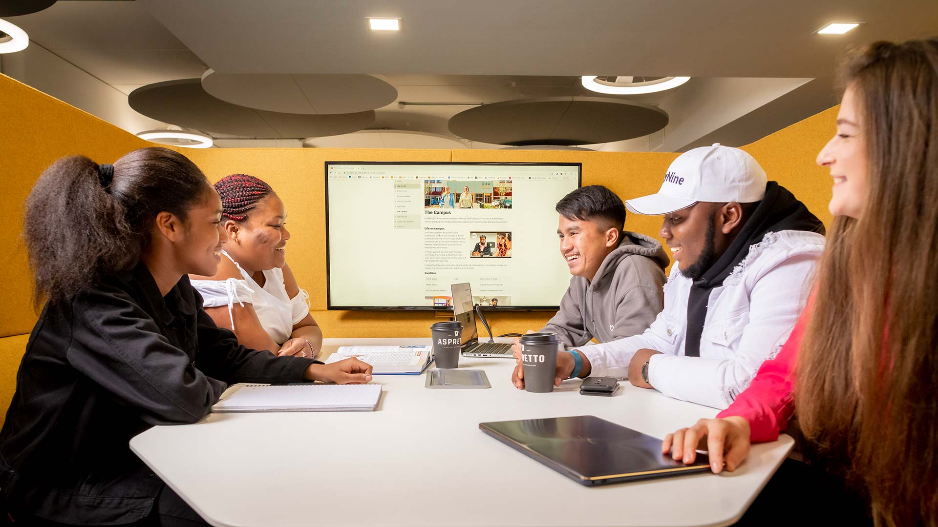 Group of students working together in a study space