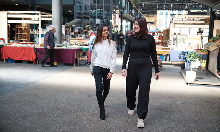 Students walking through Spitalfields Market in London