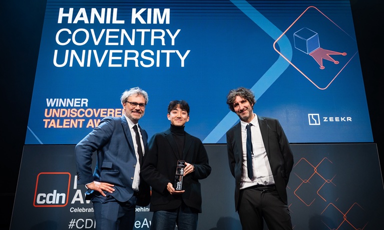Hanil Kim accepting an award