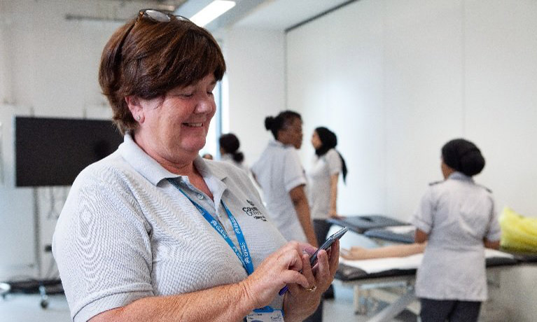 Coventry University lecturer Jane Rudge with the UK'sfirst standalone 5G device