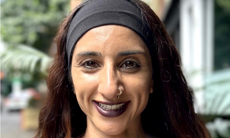 A head and shoulders image of Harky smiling at the camera