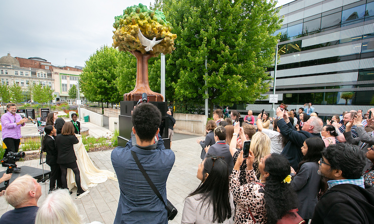 Andy Serkis and Margaret Casely-Hayford speak to the BBC in front of the newly unveiled Gallery of Living History tree of hands sculpture