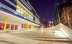 The Hub and stairs towards the side at night