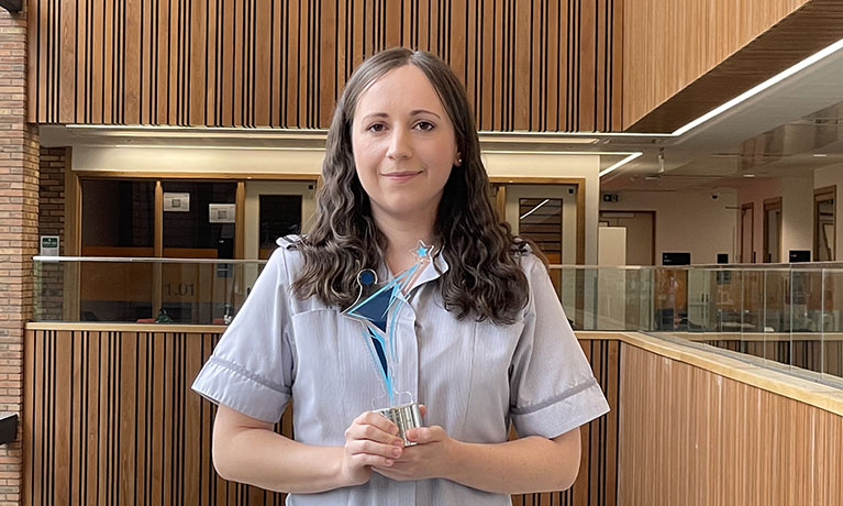 Coventry University nursing student Jessica Vaughan pictured holding her Nursing Times Student of the Year award for the adult nursing category