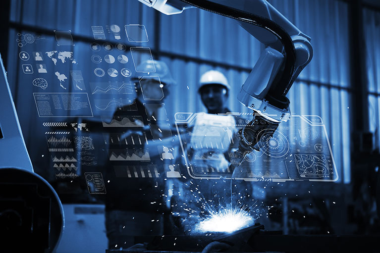 Two workers behind an AI screen