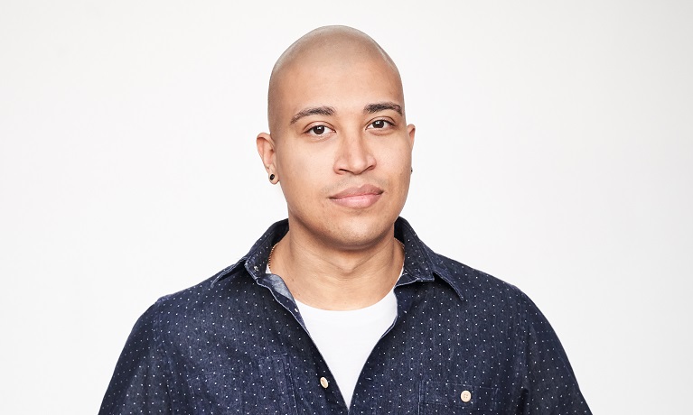 A head and shoulders picture of a man against a white background