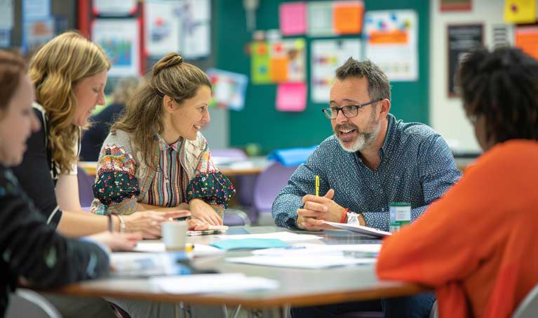 A group of teachers in a meeting