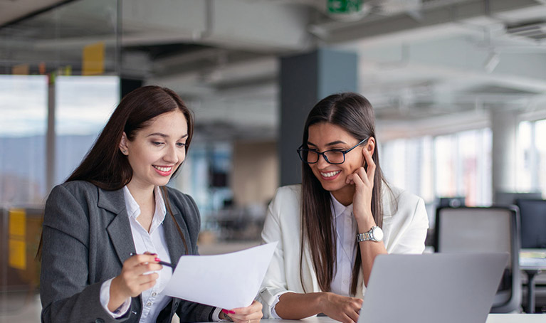 People working together with a laptop