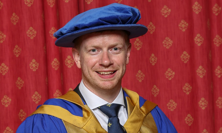 James Roberts in his Graduation gown